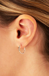 14k W Gold 1.5x15mm Hollow Hoop Earrings