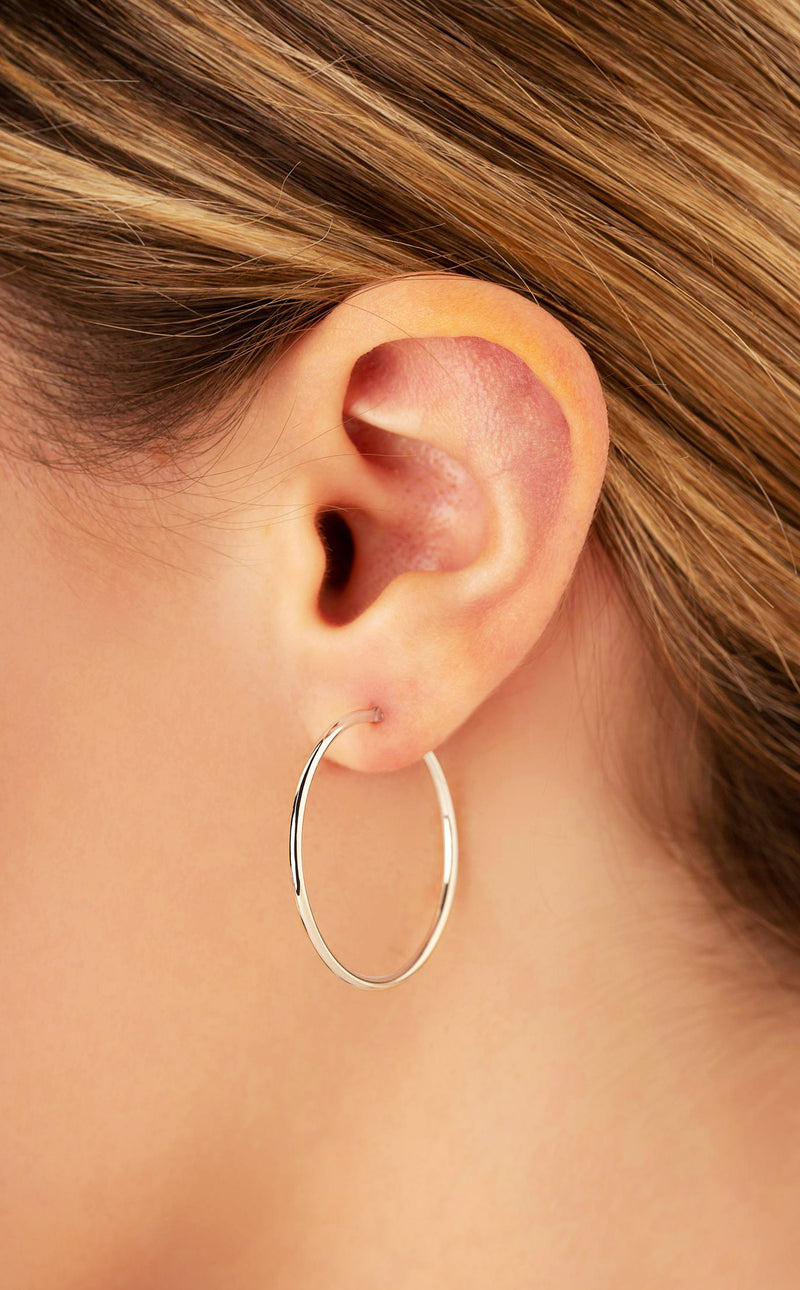 14k W Gold 1.5x30mm Hollow Hoop Earrings