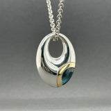 Estate Movado SS 18 3.56ct Blue Topaz Pendant