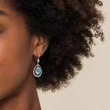 SS 14 5.69ctw Pear Shape Blue Topaz Drop Earrings