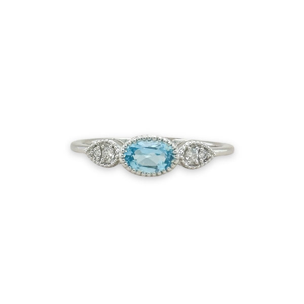 14K W Gold 0.05ctw Diamond 0.50ct Oval Blue Topaz Ring - Walter Bauman Jewelers