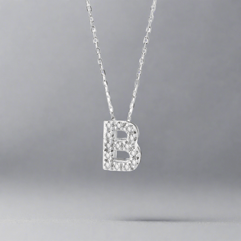 14K W Gold small 0.02ctw H/I1-SI2 diamond initial 'B' pendant - Walter Bauman Jewelers