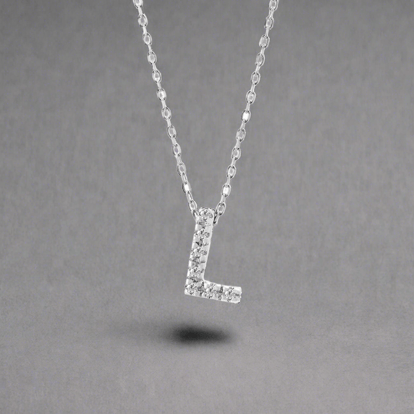 14K W Gold small 0.02ctw H/I1-SI2 diamond initial 'L' pendant - Walter Bauman Jewelers