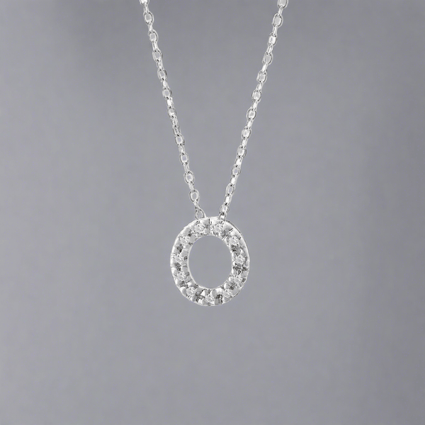 14K W Gold small 0.02ctw H/I1-SI2 diamond initial 'O' pendant - Walter Bauman Jewelers