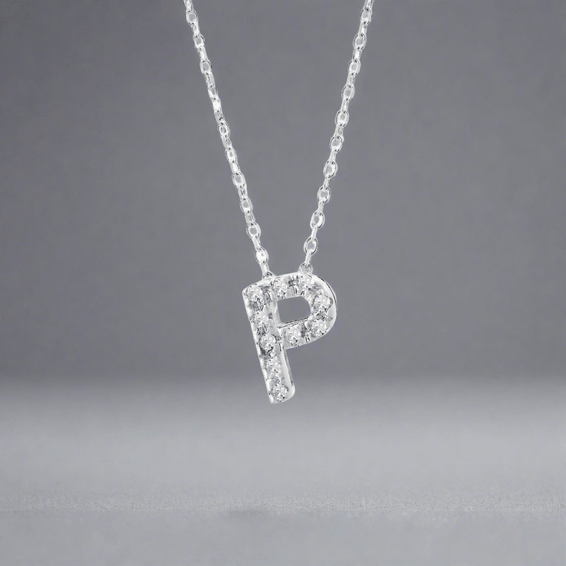 14K W Gold small 0.02ctw H/I1-SI2 diamond initial 'P' pendant - Walter Bauman Jewelers