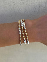 14K Yellow Gold Filled 4mm Bracelet with 5mm Sterling Silver Beads 6.25 - Walter Bauman Jewelers