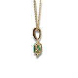 14K Y Gold 0.12ctw H/SI1 Diamond and 0.72ctw Halo Emerald Pendant