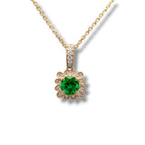 14K Y Gold 0.12ctw H/SI1 Diamond and 0.72ctw Halo Emerald Pendant