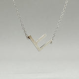 Colgante SS con inicial "F" lateral