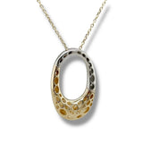 14K TT 0.18ctw G/SI1 Oval Bezel Set Diamond Pendant