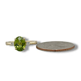14K Y Gold 0.09ctw Diamond and 2.10ct Oval Peridot Ring