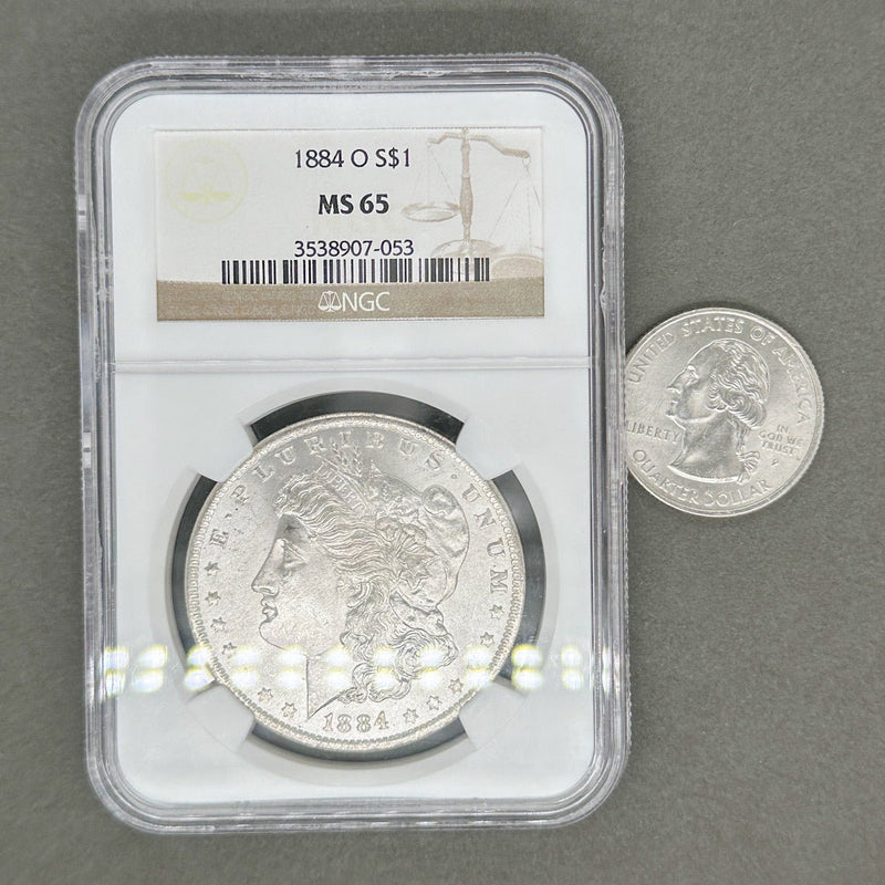 Estate 0.9 Fine Silver 1884 - O $1 Morgan Dollar NGC MS 65 - Walter Bauman Jewelers