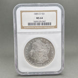 Estate 0.9 Fine Silver 1885 - O $1 Morgan Dollar NGC MS 64 - Walter Bauman Jewelers