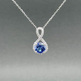 Estate 14K W Gold 0.95ct Tanzanite & 0.06ctw G - H/VS2 - SI1 Diamond Pendant - Walter Bauman Jewelers