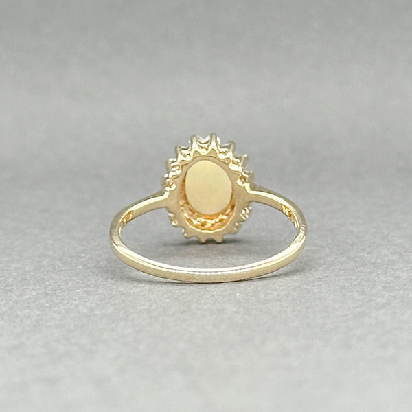 Estate 14K Y Gold 1.39ct White Opal & 0.16ctw H - I/SI1 - 2 Diamond Halo Ring - Walter Bauman Jewelers