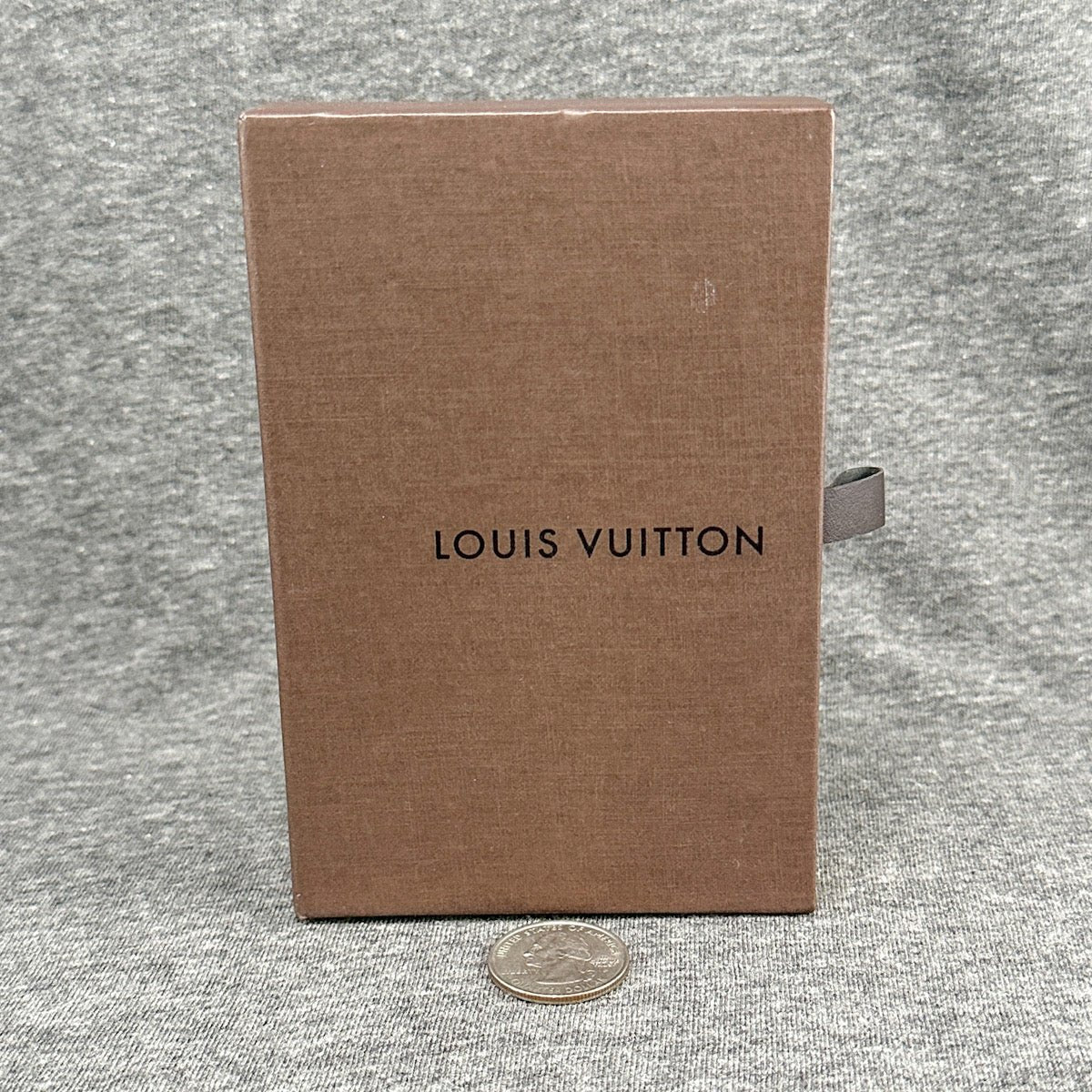 Loius Veuitton just offers a brown box with a drawer.