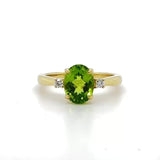 14K Y Gold 0.09ctw Diamond and 2.10ct Oval Peridot Ring
