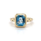 14K Y Gold 0.11ctw Diamond and 2.66ct Blue Topaz Ring