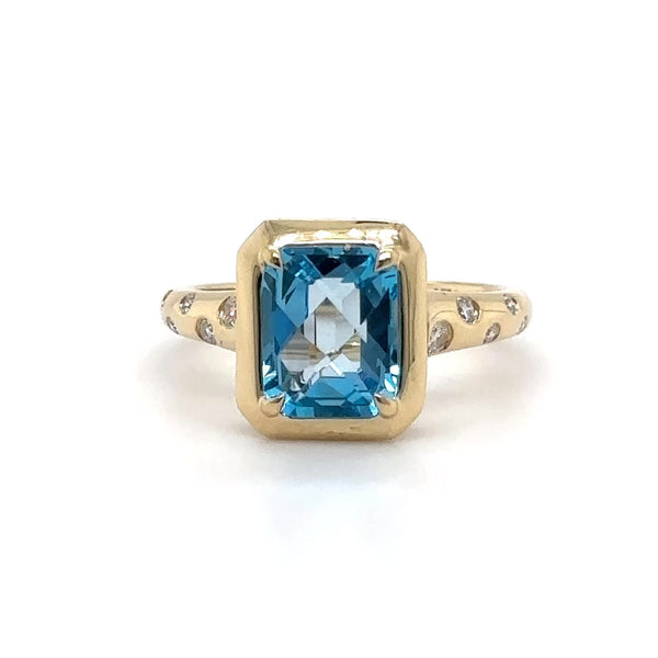 14K Y Gold 0.11ctw Diamond and 2.66ct Blue Topaz Ring