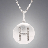 SS 0.05 H/SI1-SI2 Diamond H Initial Disk Pendant - Walter Bauman Jewelers