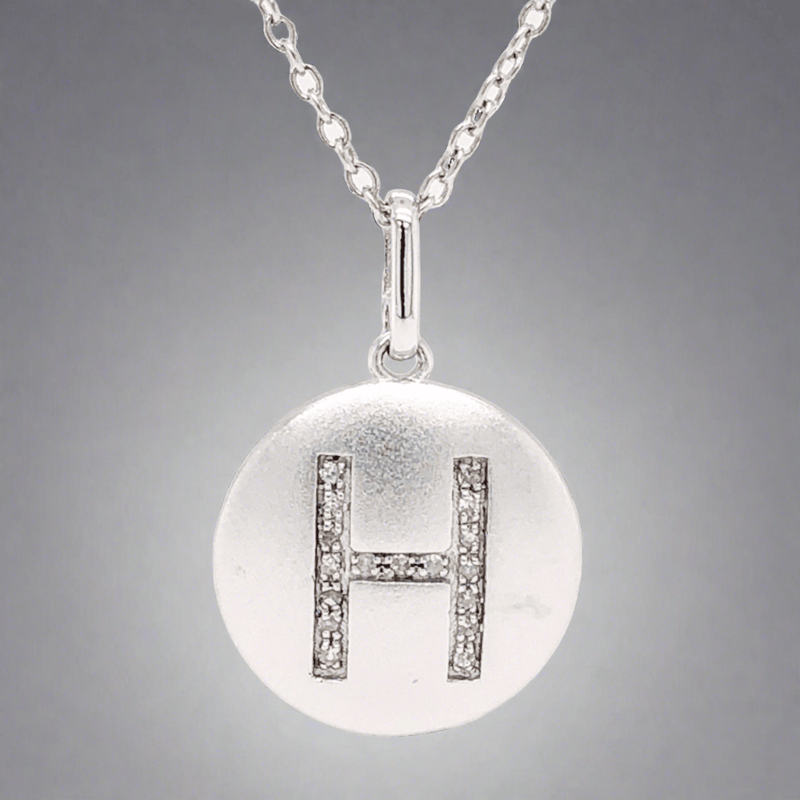 SS 0.05 H/SI1-SI2 Diamond H Initial Disk Pendant - Walter Bauman Jewelers