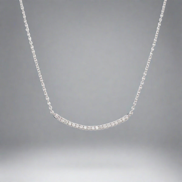 14K W Gold 0.15ctw Curved Diamond Bar Pendant - Walter Bauman Jewelers