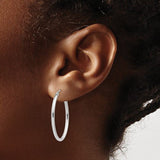 14K W Gold 2mm Oval Hoop Earrings - Walter Bauman Jewelers