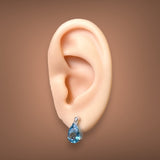 14K W Gold 3.30cttw Blue Topaz & 0.02cttw H/SI2 Diamond Drop Earrings - Walter Bauman Jewelers