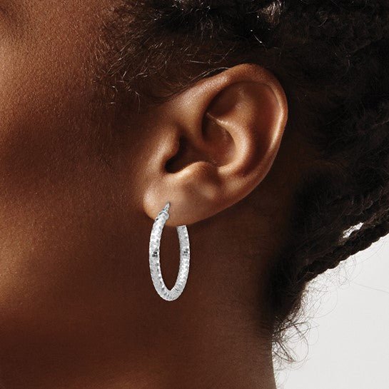 14k W Gold 3x27mm Dia Cut Hoop Earrings - Walter Bauman Jewelers