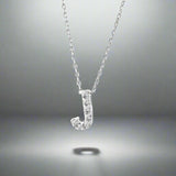 14K W Gold small diamond initial 'J' pendant - Walter Bauman Jewelers