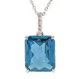 14K WG .03cttw London Blue Topaz Pendant - Walter Bauman Jewelers