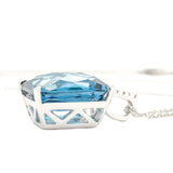 14K WG .03cttw London Blue Topaz Pendant - Walter Bauman Jewelers