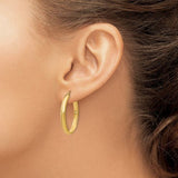 14K Y Gold Oval Hoop Earrings - Walter Bauman Jewelers