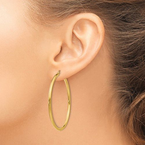 14K Y Gold Polished 50mm Tube Hoop Earrings - Walter Bauman Jewelers