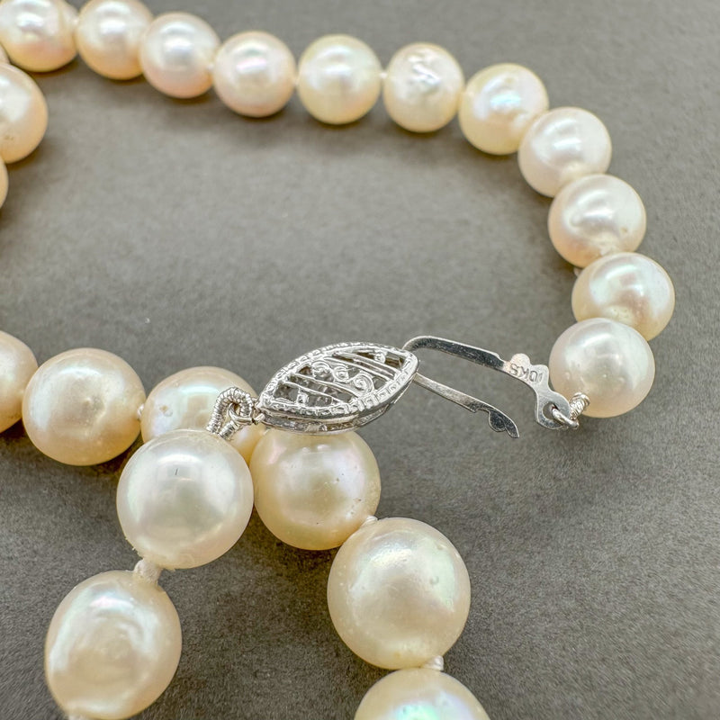 Co. 9.5-10 MM White Akoya Cultured Pearl Strand With 14k Yellow Gold Ball Clasp Co. 9.5-10 MM White Akoya Cultured Pearl Strand With 14k Yellow Gold Ball Clasp