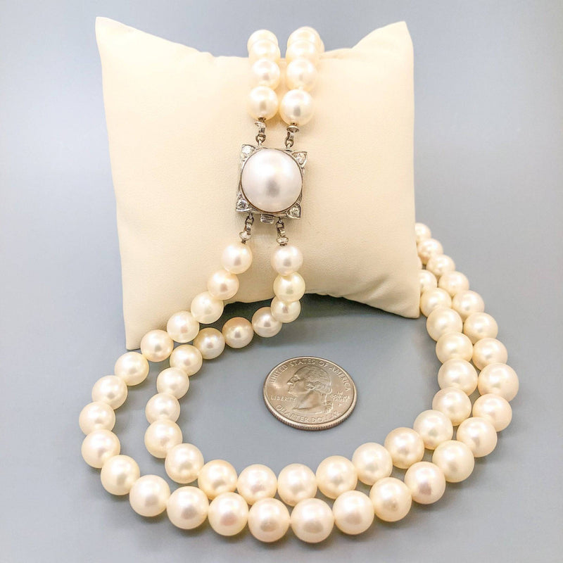 https://walterbaumanjewelers.com/cdn/shop/products/estate-14k-16-8-10mm-double-strand-cultured-pearl-necklace-840656_800x.jpg?v=1663776831