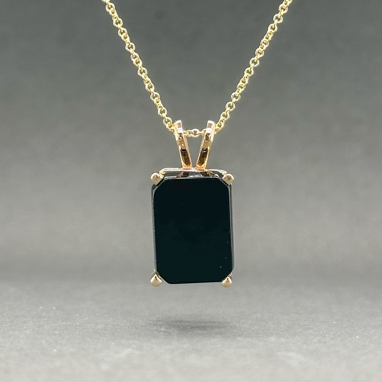 14k Gold pendant With black online stone