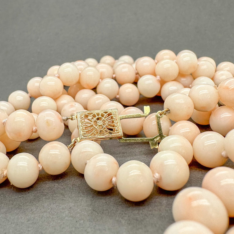 https://walterbaumanjewelers.com/cdn/shop/products/estate-14k-y-gold-double-strand-21-coral-bead-necklace-147183_800x.jpg?v=1671581043