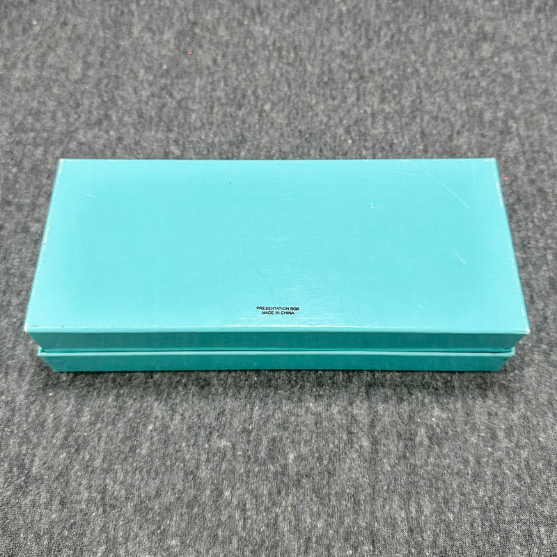 https://walterbaumanjewelers.com/cdn/shop/products/estate-tco-outer-inner-blue-boxesempty-573263_800x.jpg?v=1677814743