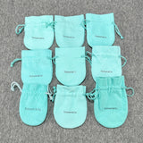 Estate T&Co. Set of 9 Small Drawstring Pouches (Empty) - Walter Bauman Jewelers
