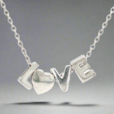 SS "LOVE" Pendant - Walter Bauman Jewelers