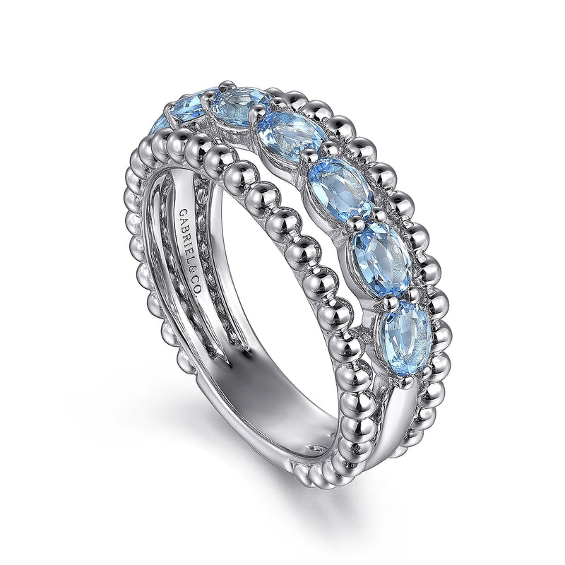 SS Ring With 7 Oval Swiss Blue Topaz - Walter Bauman Jewelers